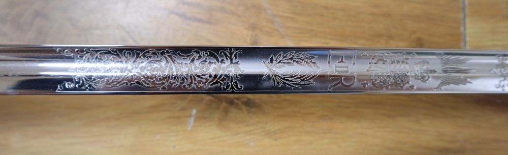 An officers sword, shagreen grip and 88cm etched, single-edged blade, in scabbard